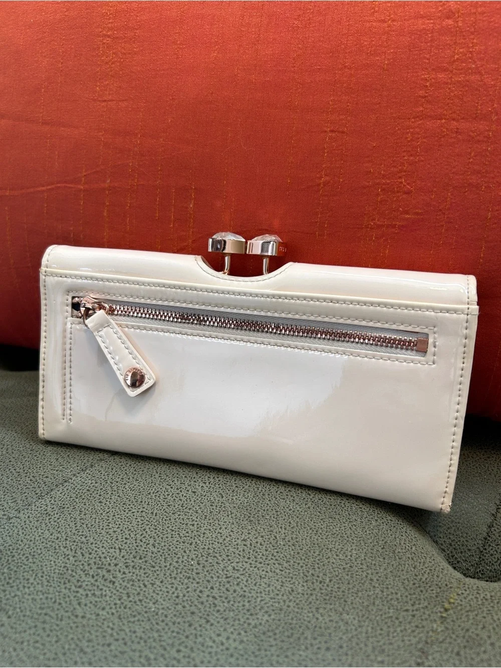 Ted Baker Glossy Patent Clutch in Light Cream